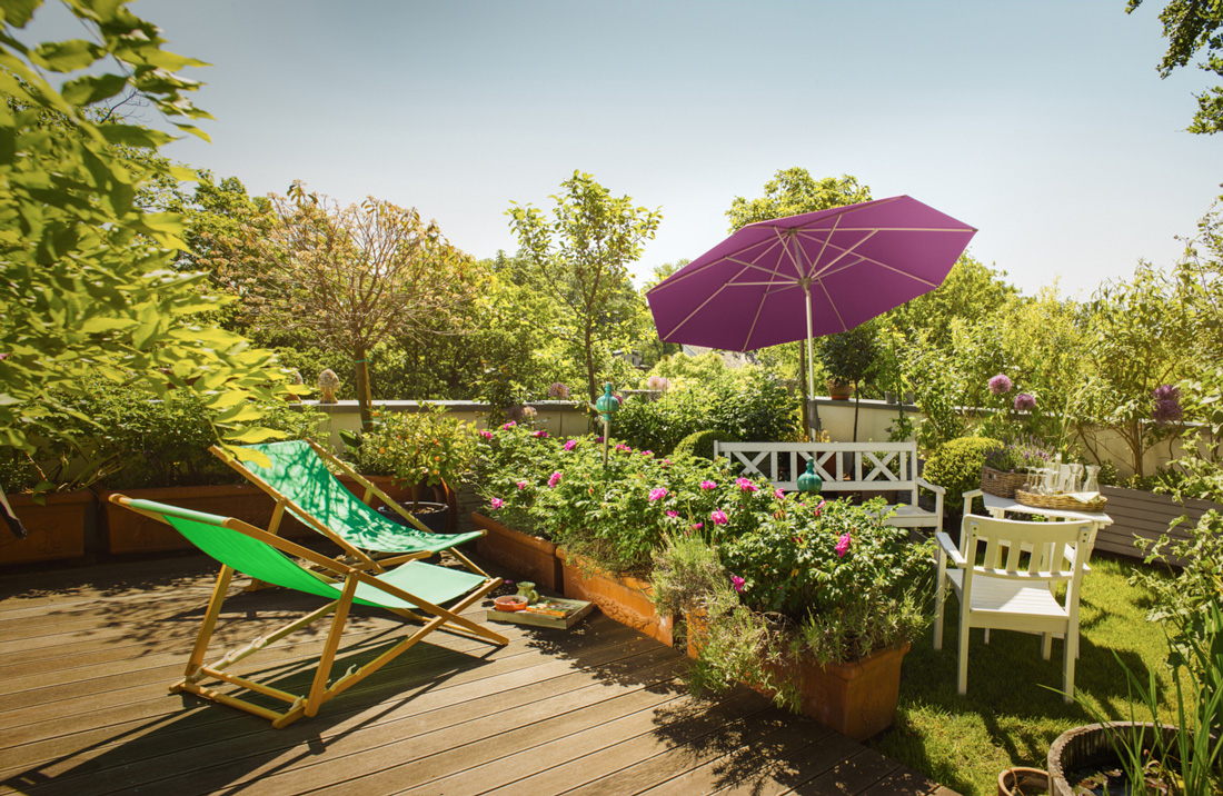 Ronde kleurrijke Glatz parasols fleuren je tuin helemaal op.