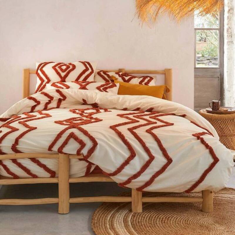 Het verhoogd etnisch getuft patroon is geïnspireerd op de Berberse stijl en past hierdoor heel goed bij je bohemian slaapkamer. 