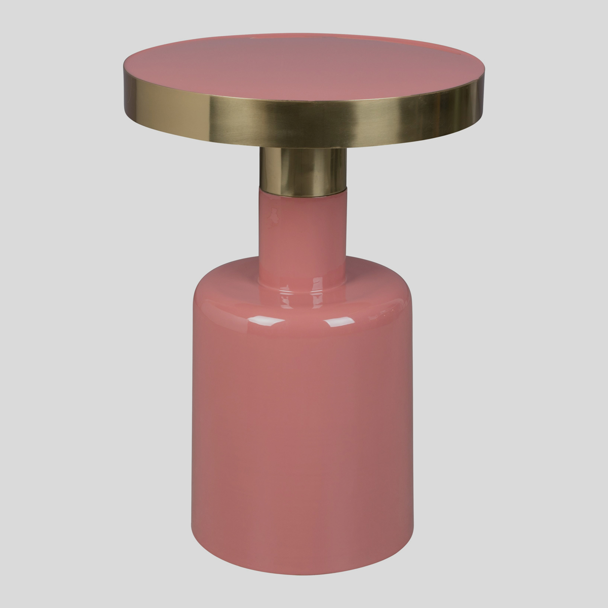 De kleurencombinatie roze met goud bij deze hoge bijzettafel van Zuiver is om van te smullen! 